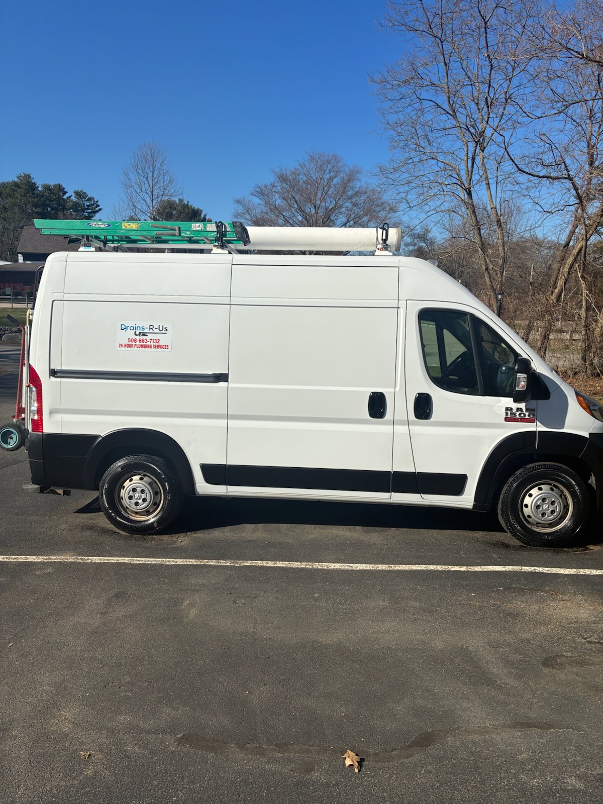Drains-R-Us branded service van
